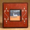 #TC-1233301     
     $19.09
camel colored leather with studs
Frame 3" x 3"