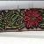 Carving Pattern:
   Poppy LU-CB1130

Shown Item Belt #705    $   1 done.
Painted Red, blue, silver poppys with green leaves. Highlighted with black. Red synthics rhinestones on green leaves. Stricking belt.  

IN STOCK several to dye, paint & finish to your specifications.