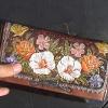 TL

Kelly clutch floral & geo

Item #901J        $160.00