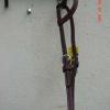 New 1/2" Heavy Duty Headstall

1/2" wide x 1/4" thick straps.
Made with quality bridle leather, dyed burgundy or latigo red.

Round attachment buckles.

Adjustable sliding ear-band.

Leather thongs to tie bit attachment.

Item #29

$26.00 plus shipping